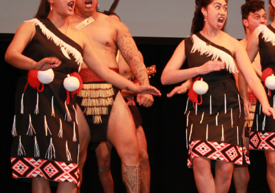 Our wahine and tane performing on stage for Haka Powhiri for NZSE Graduation