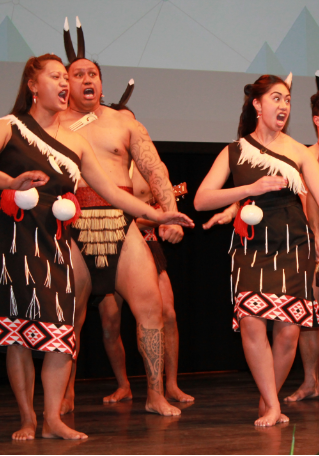 Our wahine and tane performing on stage for Haka Powhiri for NZSE Graduation