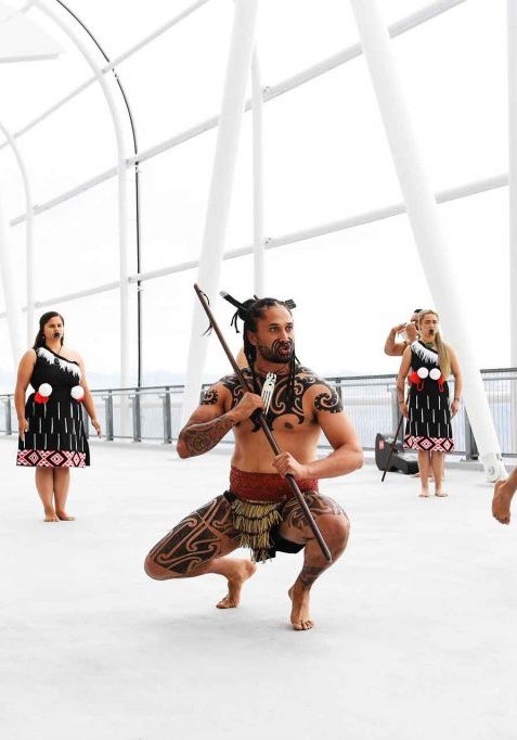 A Haka Group called The Haka Experience welcome guest into Eden Park in Auckland